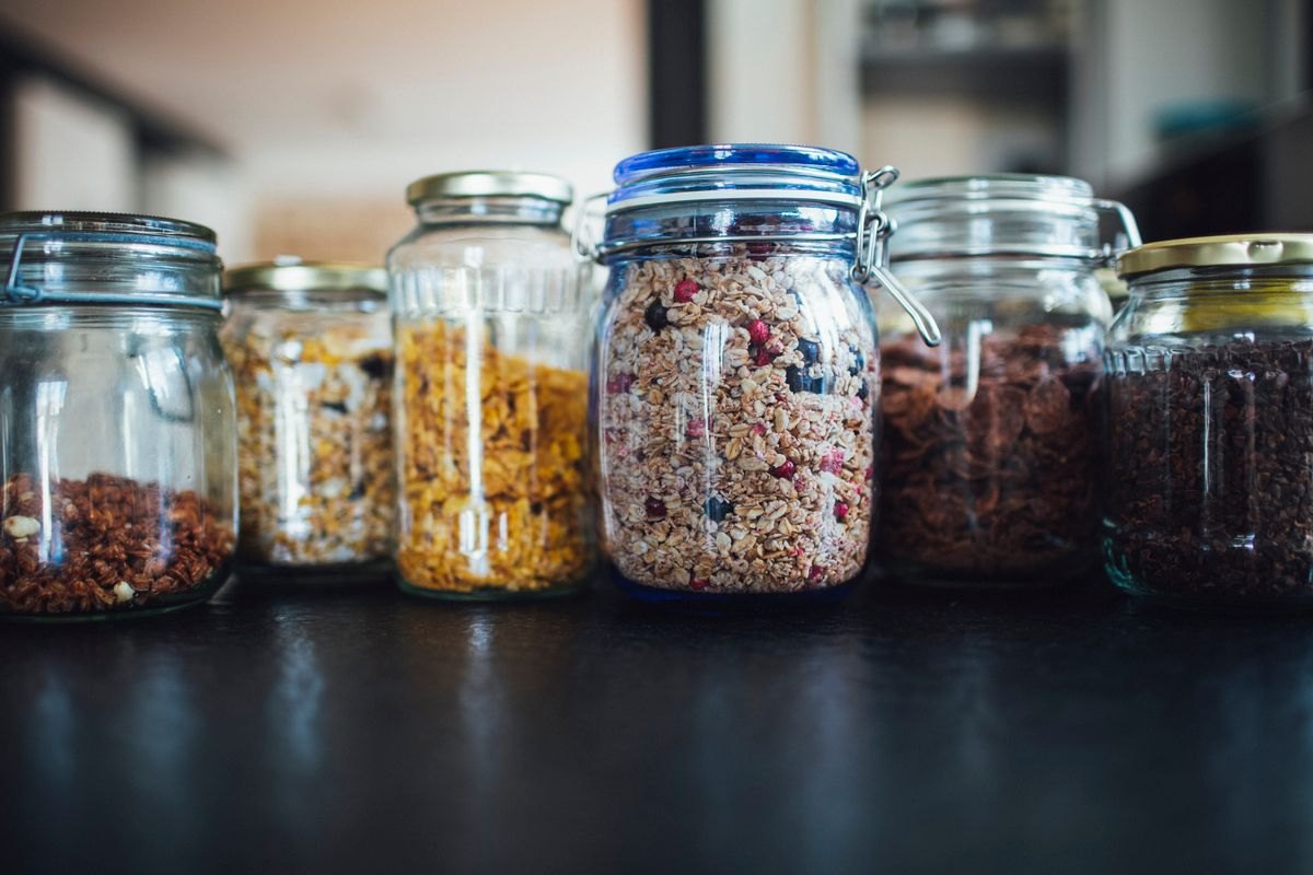 Everyday cereals and dry ingredients stored in kitchen jars