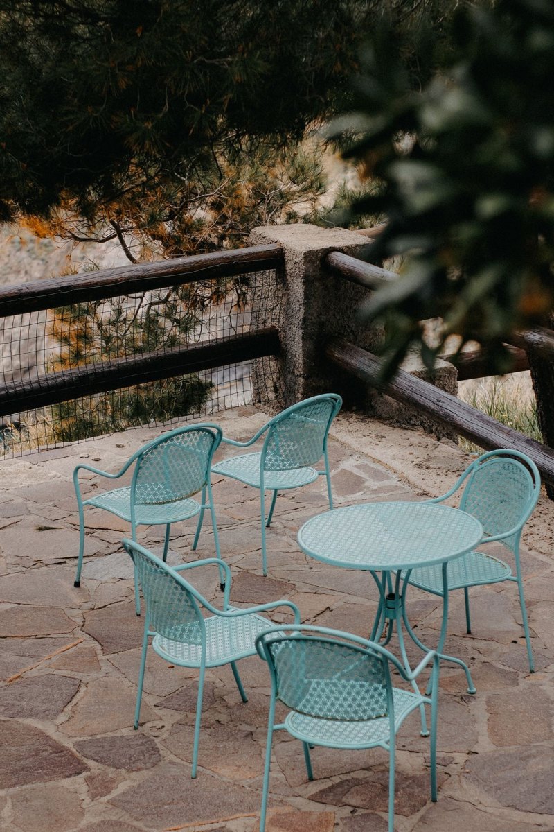 Outdoor chairs and a table on a patio